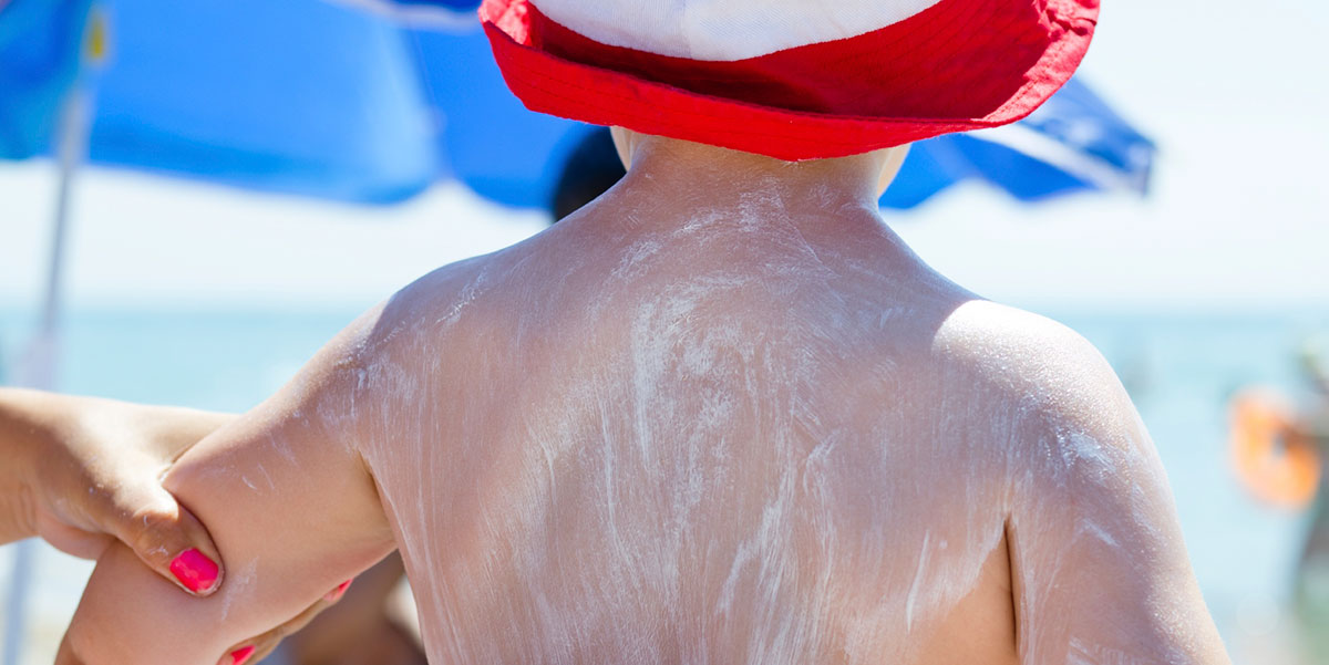 https://travelhealthpro.org.uk/media_lib/mlib-uploads/full/iStock_boy-with-suntan-lotion.jpg